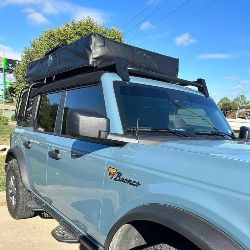 overland-vehicle-systems-nomadic-extended-soft-shell-roof-top-tent-closed-front-corner-view-on-ford-bronco