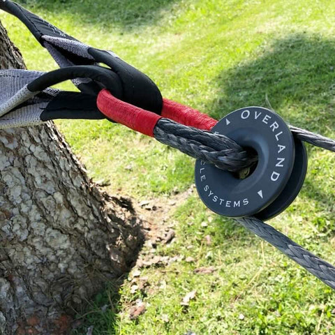 overland-vehicle-systems-soft-shackle-recovery-ring-and-tree-saver-strap-front-view-in-nature