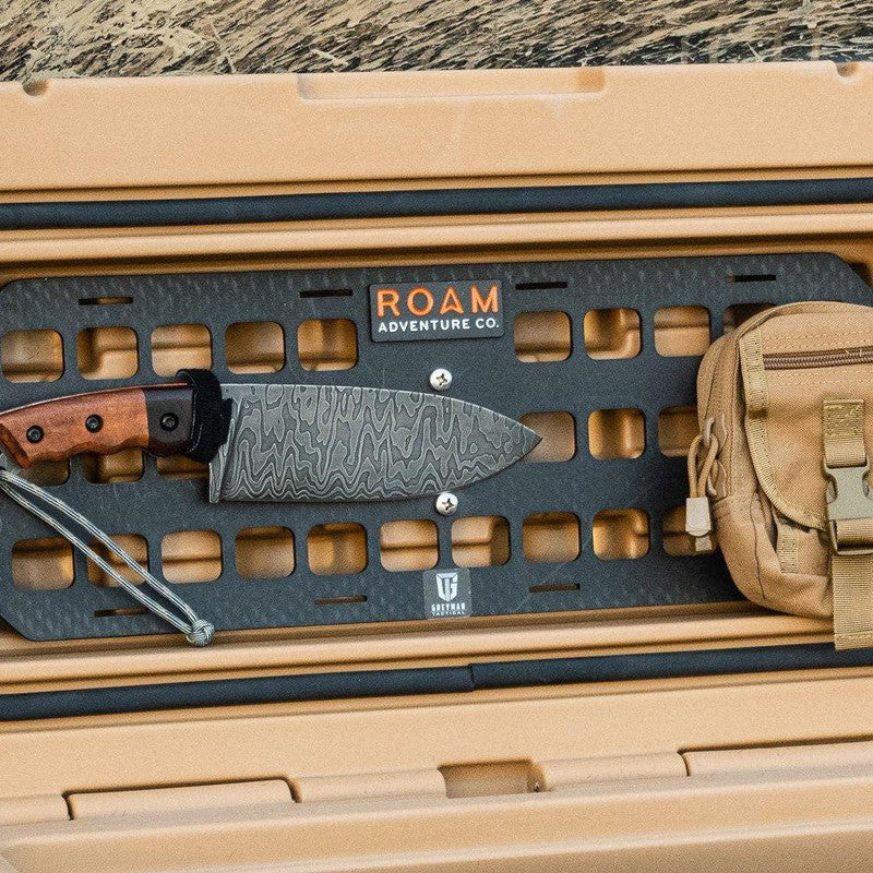 roam-95l-rugged-case-molle-panel-front-corner-view-in-rugged-case-in-nature