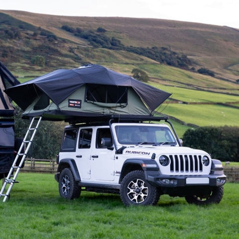 tentbox-lite-xl-soft-shell-roof-top-tent-forest-green-open-front-corner-view-on-jeep-rubicon-in-nature