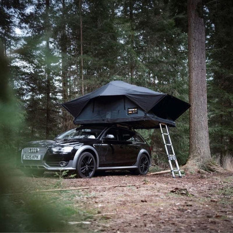 tentbox-lite-xl-soft-shell-roof-top-tent-slate-gray-open-front-corner-view-on-audi-a4-in-forest