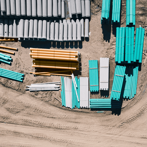 Municipal underground water pipeline lay down yard from the air