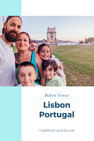 Our Silver Coast Life family of six in front of Belem Tower in Lisbon Portugal.