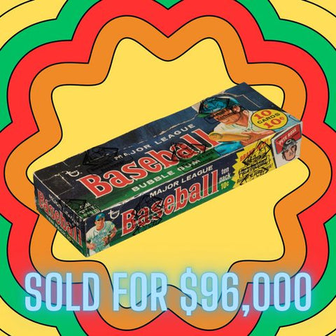 An unopened 1970 Topps Baseball Box displayed on the auction table, a pristine symbol of vintage sports memorabilia that fetched $96,000 at the recent auction