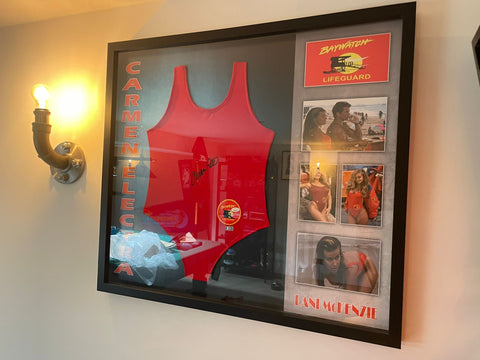 Carmen Electra's signed Baywatch swimsuit, a collector's gem, sold by MJB Memorabilia