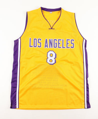 An authentic signed Kobe Bryant career highlights jersey, size XL, displayed against a neutral backdrop. The high-quality stitching and intricate details of the jersey are prominently showcased