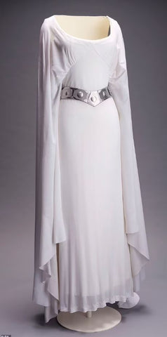 Carrie Fisher's iconic white gown as Princess Leia from 'Star Wars: A New Hope', a symbol of rebellion and grace, ready to be auctioned