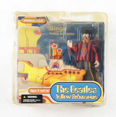 Autographed 2004 McFarlane Toys, The Beatles "Yellow Submarine" figurine set of two, signed by Ringo Starr on the outside packaging