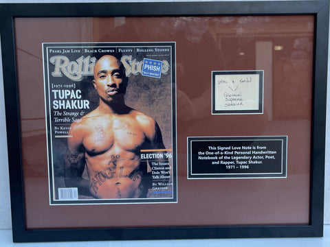 Image depicting a framed, handwritten note by the late rapper Tupac Shakur. The note is preserved under glass in a 14" x 19" custom frame. On the bottom right of the frame is a hologram and certificate of authenticity from James Spence Authentication (JSA)