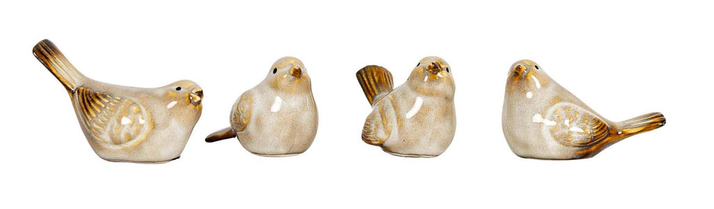 4 ceramic birds with cream reactive glaze