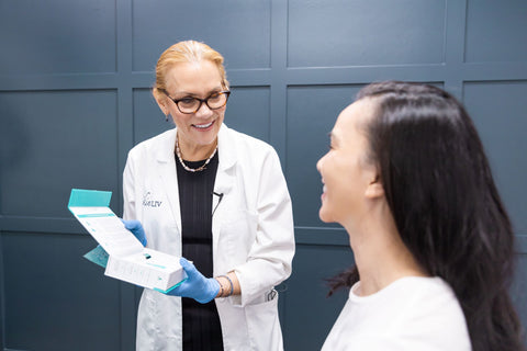 Leslie holding Post Treatment Kit