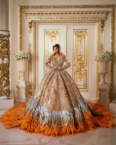 Luxurious Long Sleeve Orange Gown with Feather Accents