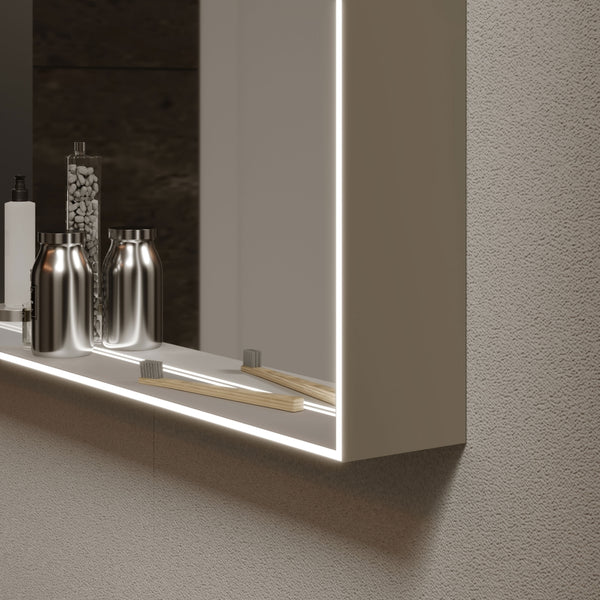 A light mirror from Top Light in a stylishly furnished bathroom