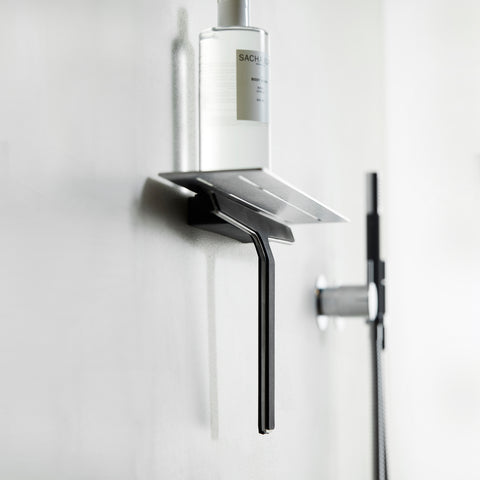 Unidrain Reframe shower shelf with shower squeegee in brushed stainless steel