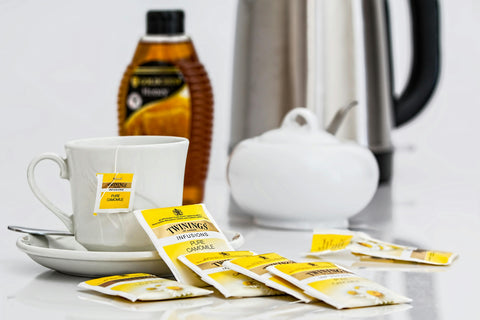 Image of a chamomile tea infusion in a cup, illustrating its anti-inflammatory and calming health benefits.