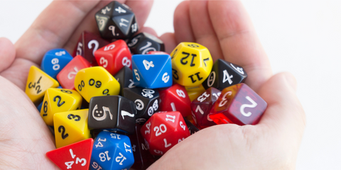 person holding dice