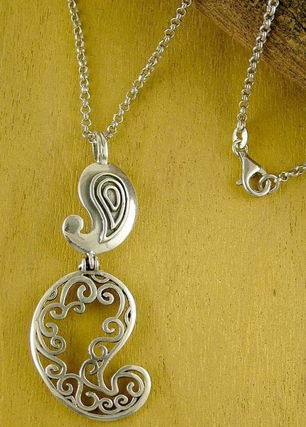 Playful and stunning double paisley pendant with fine cutout detailing ...