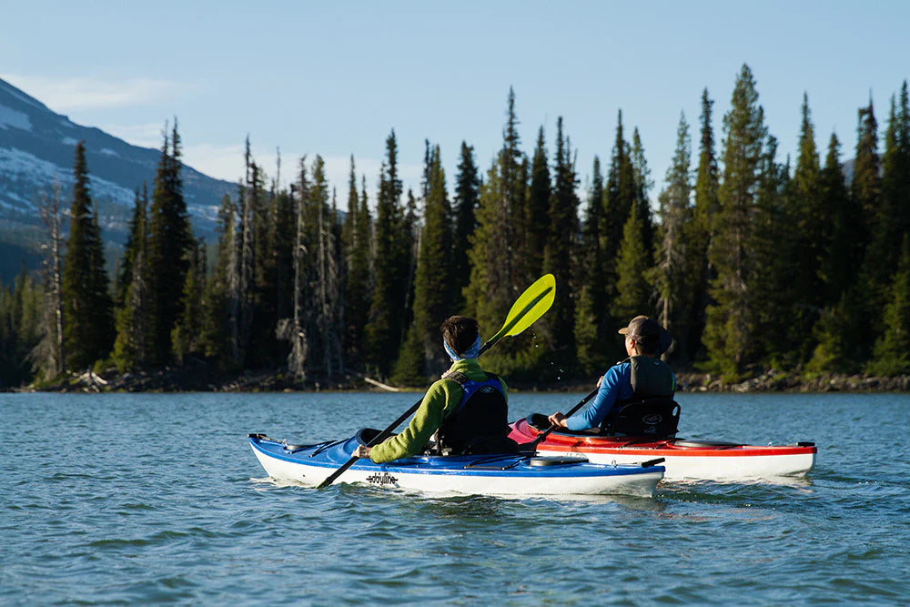 two people in eddyline kayaks