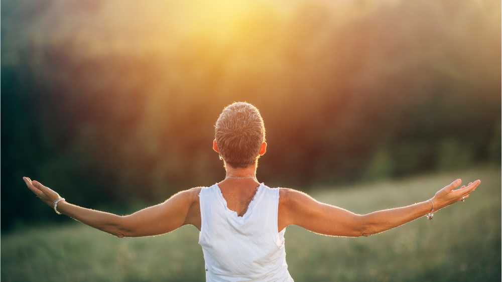 inspired person in open field