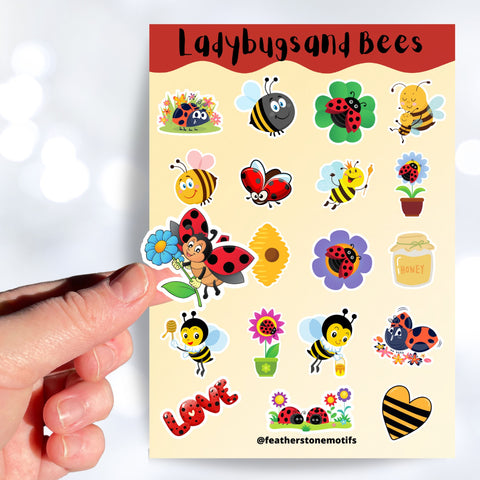 This sticker sheet has a sparkle overlay with 19 different stickers of cute ladybugs and bees. This image shows a hand holding a sticker of a ladybug with a flower over the sticker sheet.