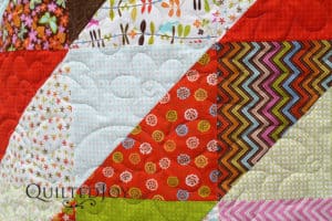 Jan's quilt incorporates both light and dark values in a fun arrangement. Come see how I quilted it on my APQS longarm and what choices we made!