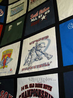 Sporty T-shirt quilt, quilted by Angela Huffman