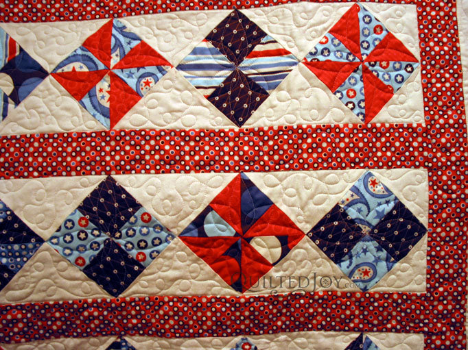 Baby Sailor quilt with custom quilting by Angela Huffman - QuiltedJoy.com