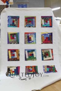 Tammie's Wonky Log Cabin quilt, quilted at Quilted Joy