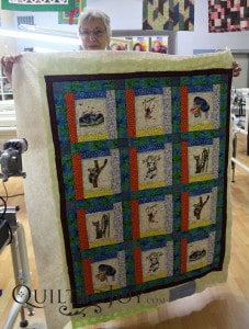 Paula brought a charity quilt for her rental certification class. - QuiltedJoy.com