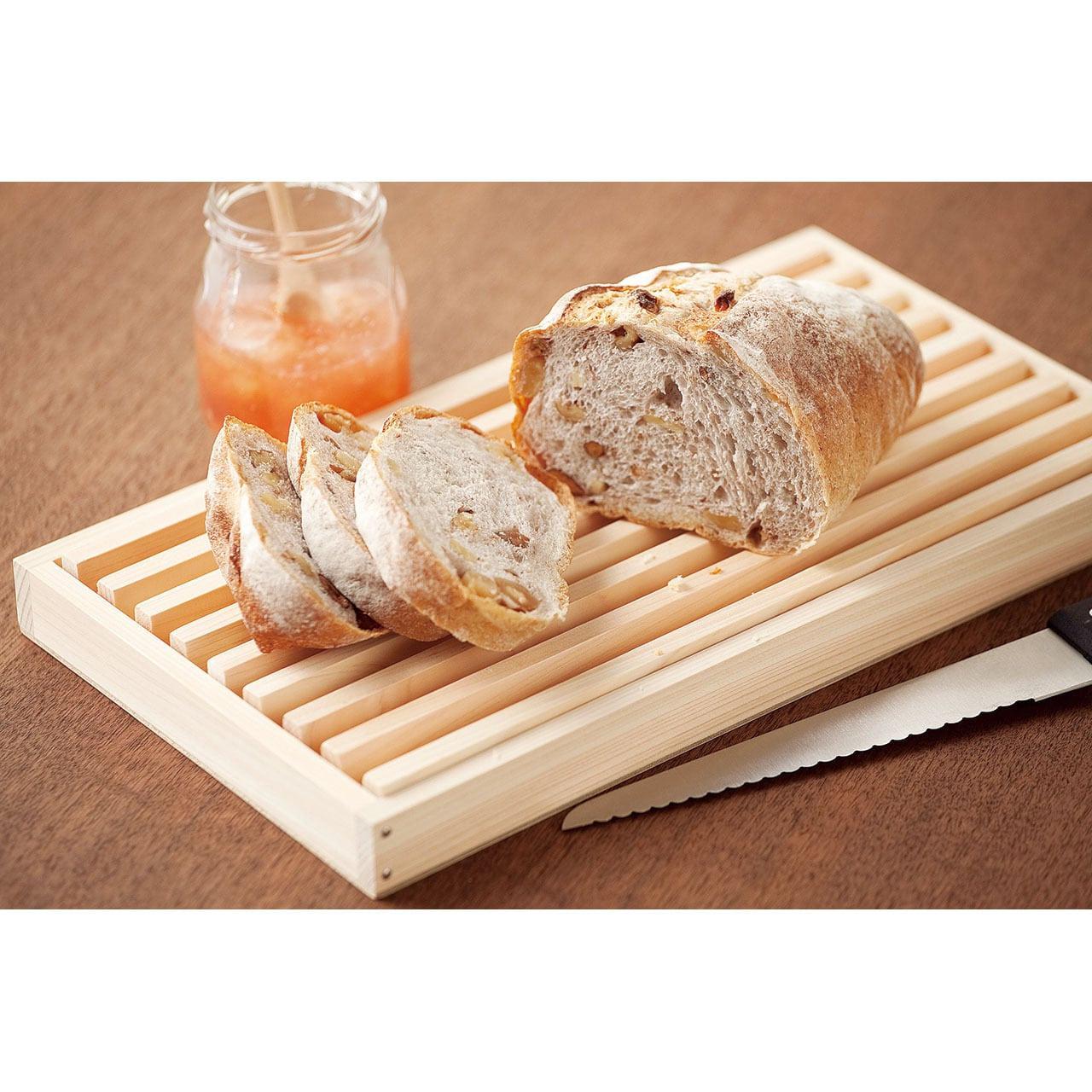 https://cdn.shopify.com/s/files/1/0695/5712/5440/products/Shimanto-Hinoki-Cypress-Bread-Cutting-Board-Japanese-Taste-2.jpg?v=1691289245