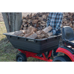 17 cubic foot poly cart being used to move wood.