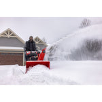 CRAFTSMAN Performance 30 Gas Snow Blower clearing driveway house to the left