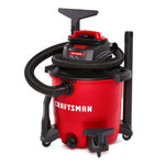 Left facing CRAFTSMAN Wet/Dry Vacuum with CRAFTSMAN 1-7/8 inch Wet Nozzle stored on board vacuum