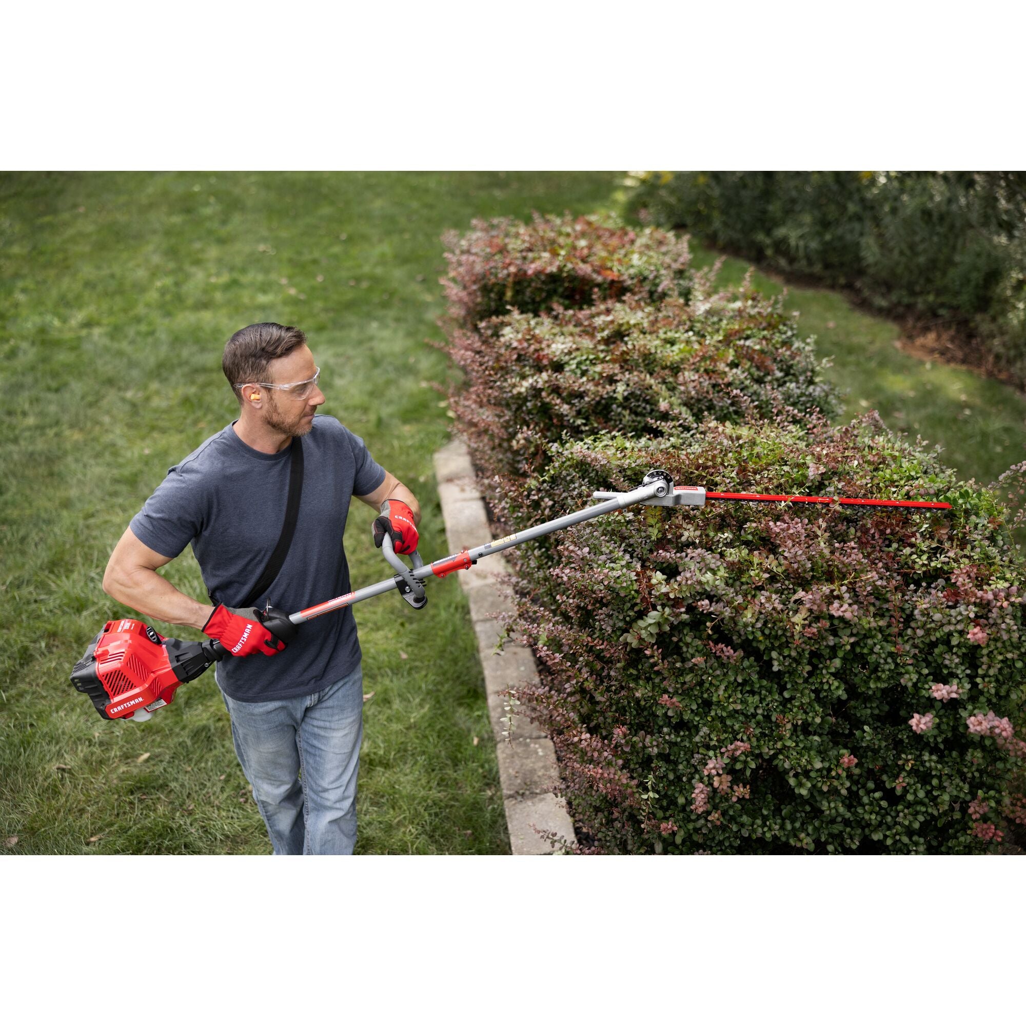 CRAFTSMAN Multi-Tool Attachment Hedge Trimmer cutting sides of hedges