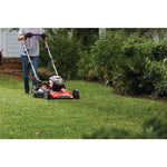 Volt 60 cordless 21 inch 3 in 1 self propelled lawn mower kit 7.5 Amp hour being used for mowing grass.