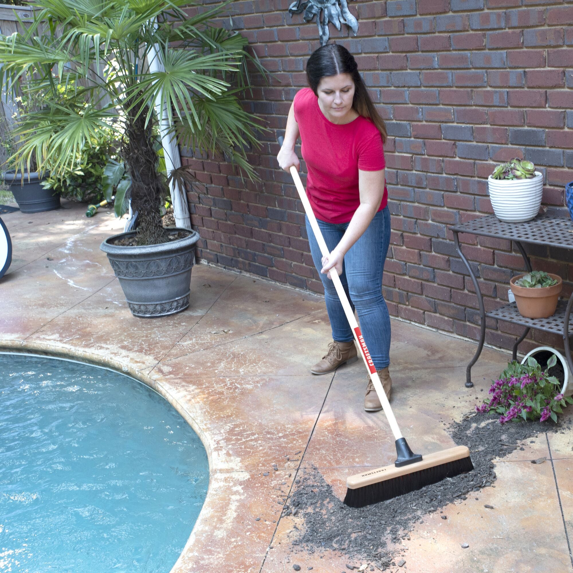 18 inch all-purpose push broom cleaning dirt off patio