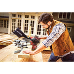 20 volt cordless 7 1 quarter inch sliding miter saw kit being used by a person.