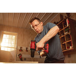 Cordless half inch drill and driver kit 1 battery being used for drilling in wood.