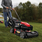 21 inch 159 c c f w d self propelled mower with v 20 battery start being used to mow the lawn.