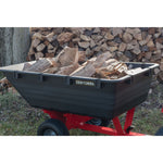 17 cubic foot poly cart being used to carry wood.