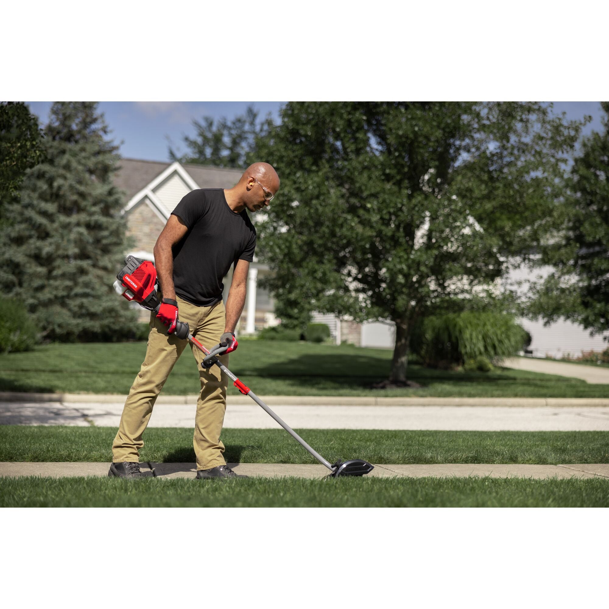 CRAFTSMAN Multi-Tool Attachment Edger edging sidewalk of home