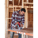 20 volt 7 1 quarter inch brushless cordless circular saw being used by a person to cut wood.