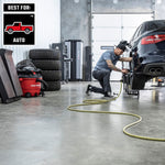 Auto enthusiast airing up car tires in garage with CRAFTSMAN 16 gallon vac neatly stored along wall