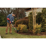 20 volt weed wacker 13 inch cordless string trimmer and edger with push button feed kit being used by a person to cut weed outdoors.