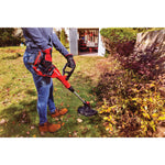 20 volt weedwacker 13 inch cordless string trimmer and edger with automatic feed kit being used by a person in garden.