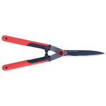 Hedge shears with closed blades.