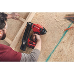 20 volt brushless cordless 21 degree plastic collated framing nailer being used by a person to nail wood bars.