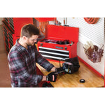 Portable 20 and 5 tenths inch Ball bearing 3 Drawer Red Steel Lockable Tool Box containing tools in use by person working on inner mechanism of a device.