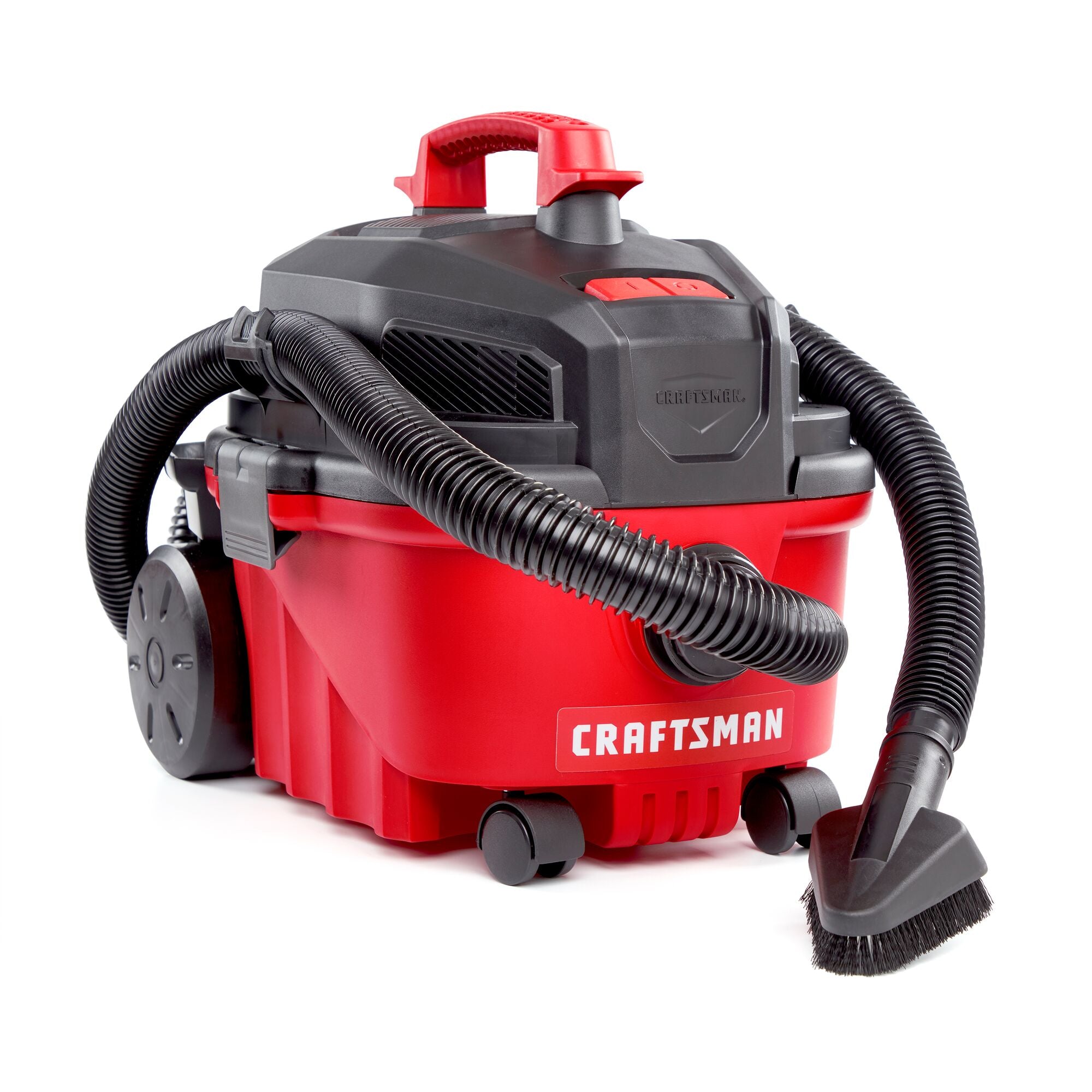 Front angled view of CRAFTSMAN 4 gallon shop vacuum with 1-1/4 inch hose, dusting brush attached