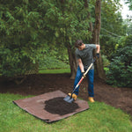 Wood handle transfer shovel being used by a person.